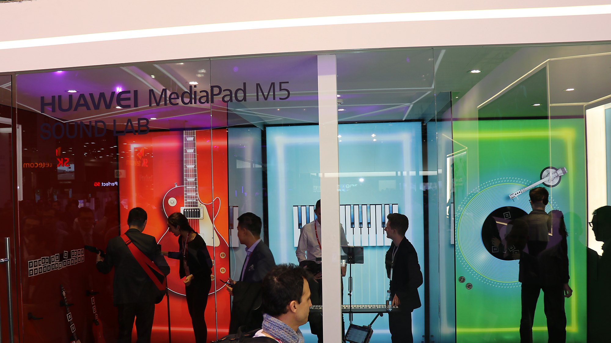 Huawei at Mobile World Congress, visitors exploring the product environment